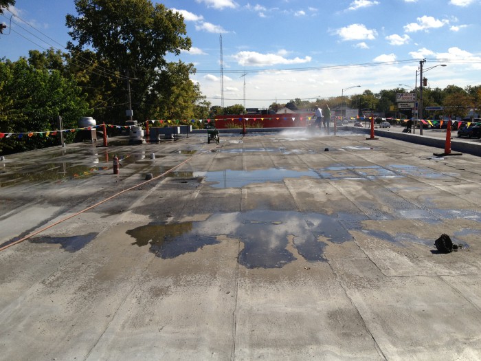 It was important to pressure wash the entire roof to remove any dirt or debris prior to applying coating.